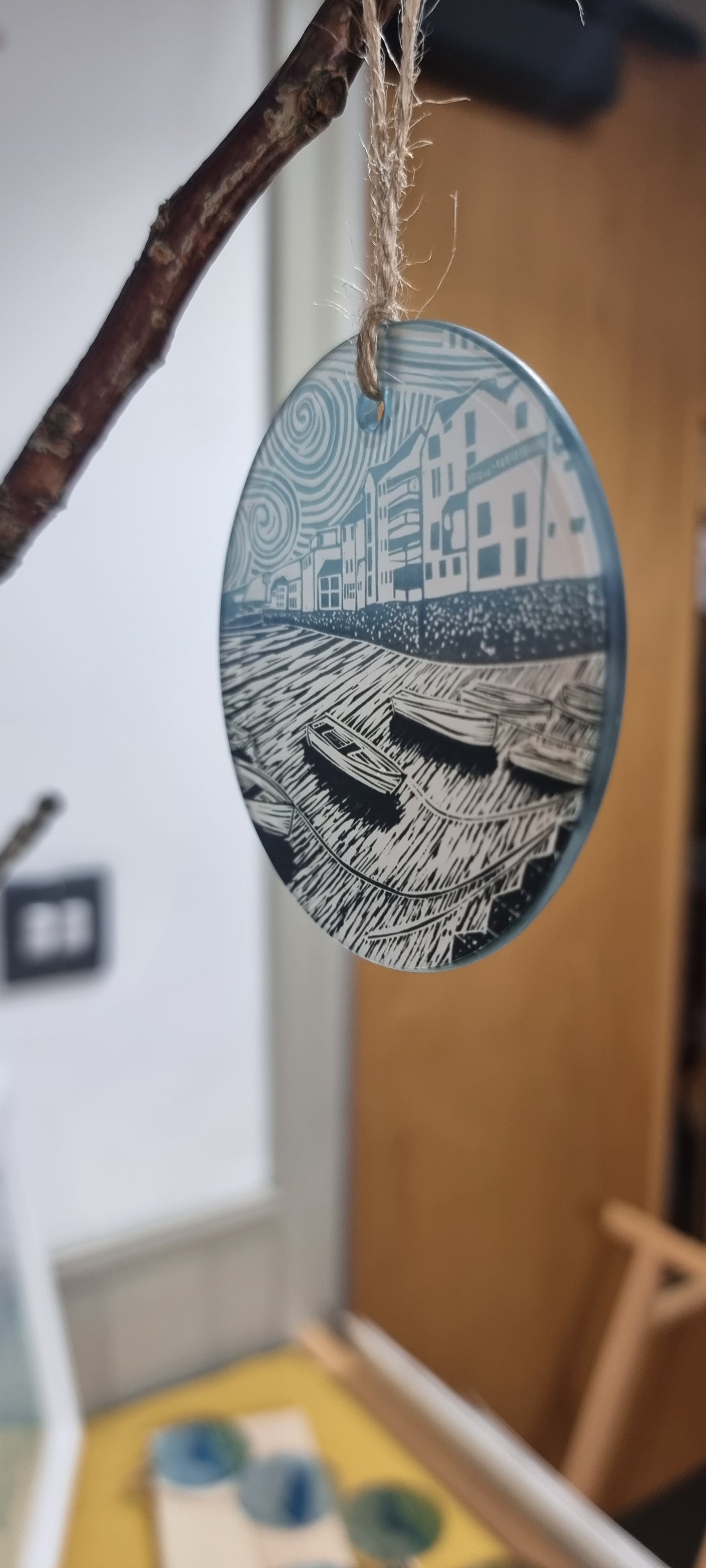 Glass decorations from lino print designs