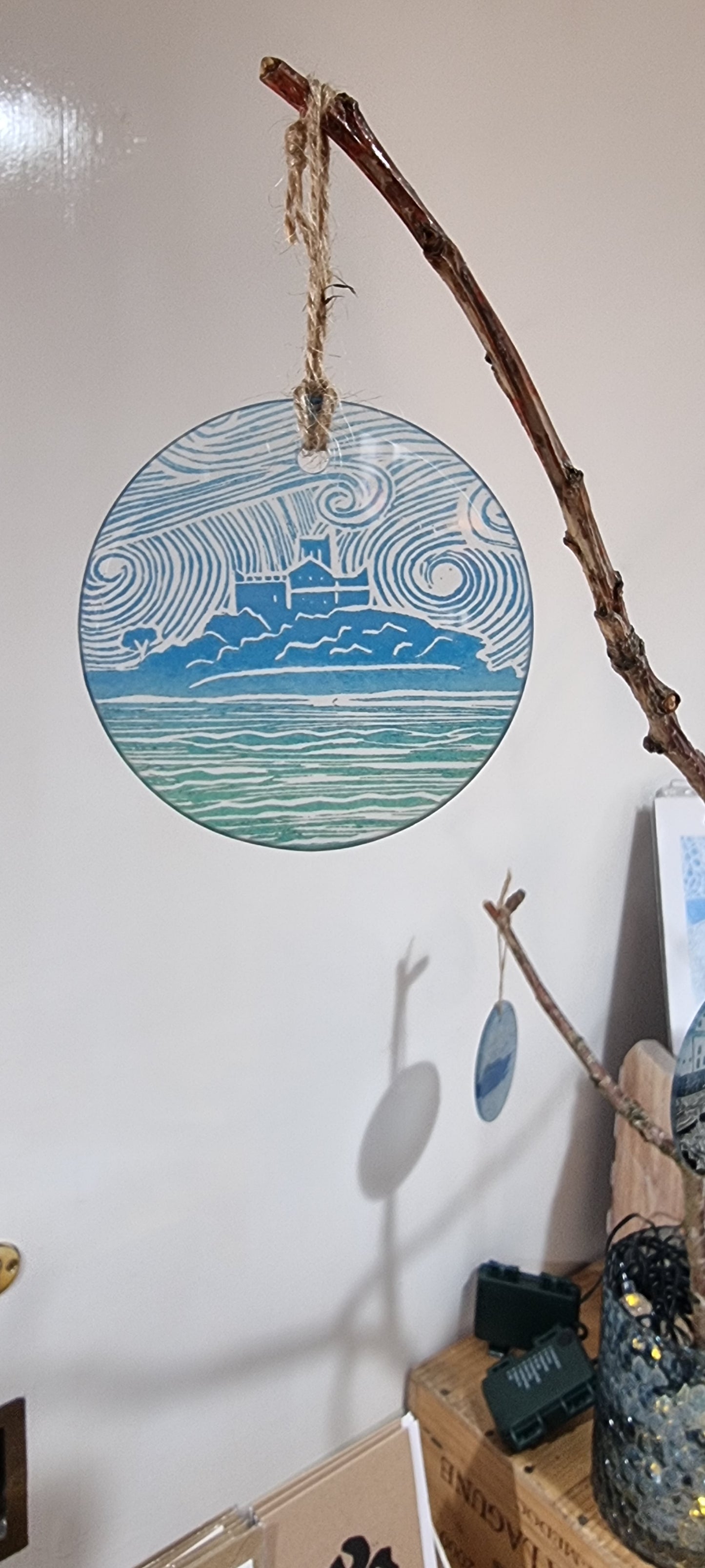 Glass decorations from lino print designs