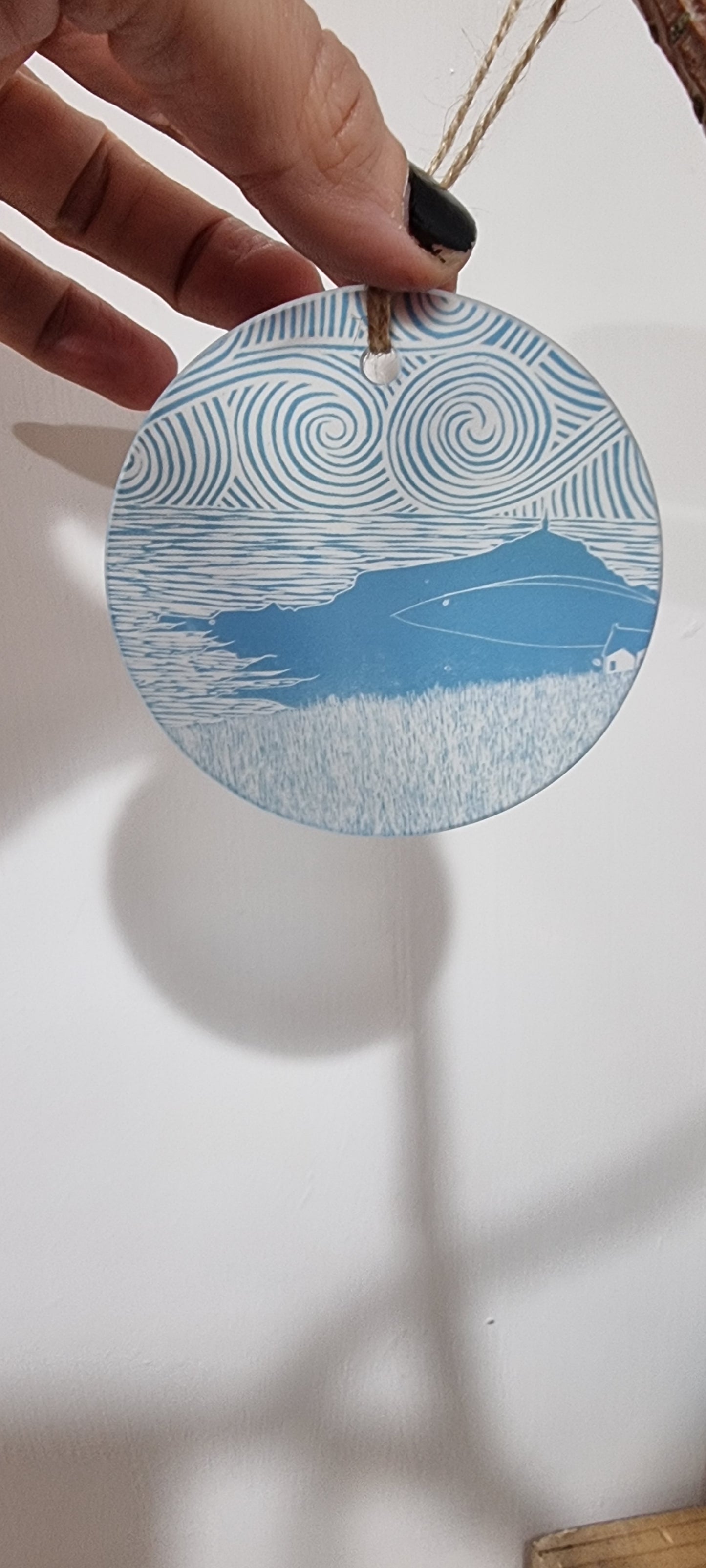 Glass decorations from lino print designs
