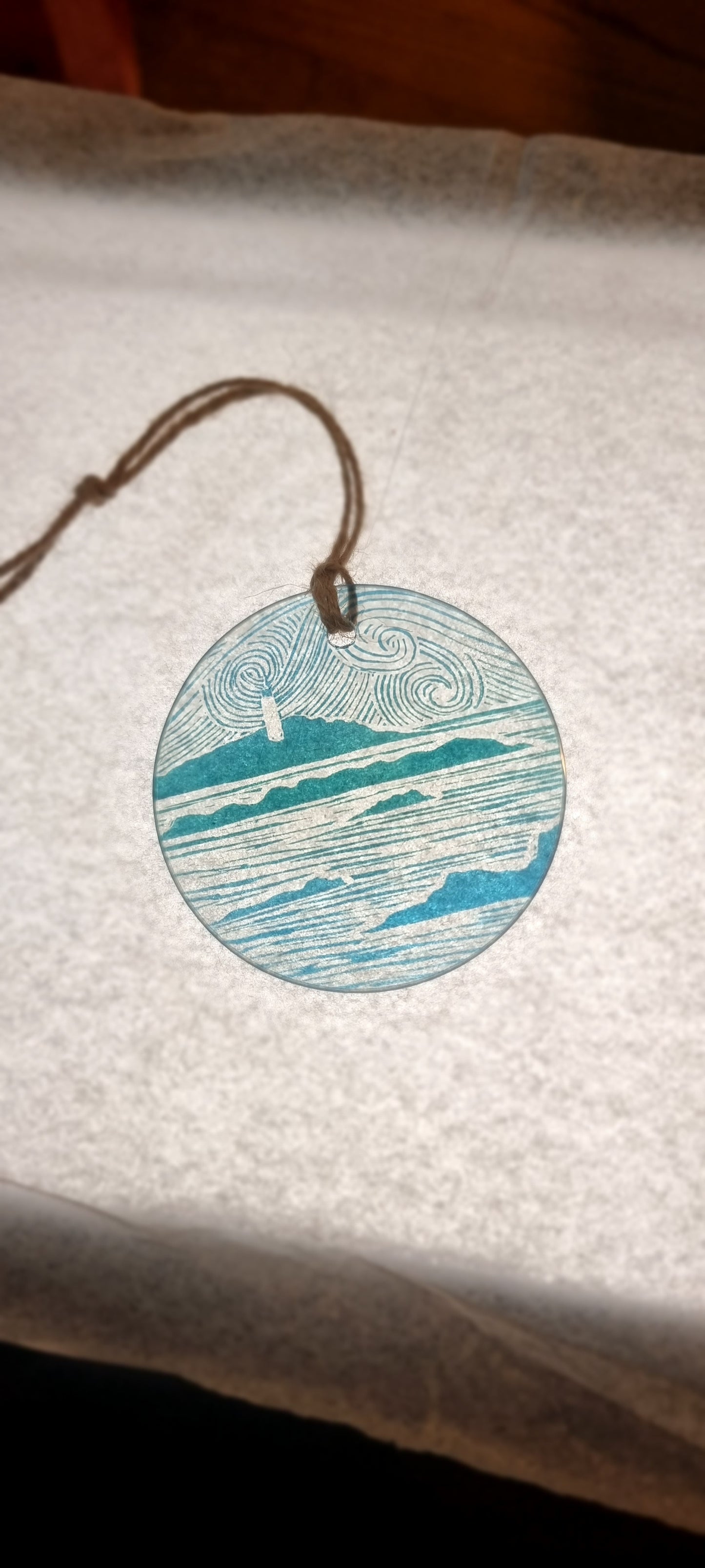 Glass decorations from lino print designs
