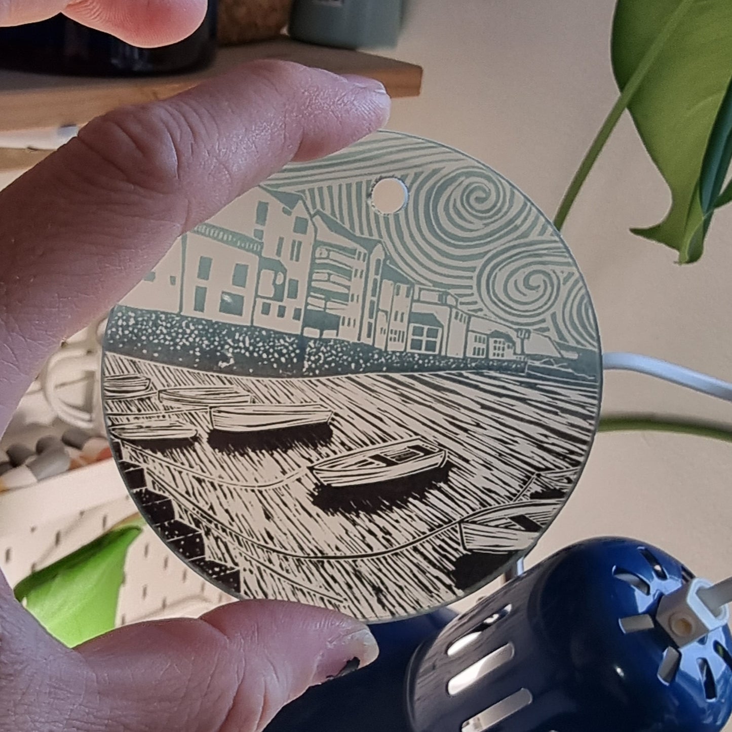 Glass decorations from lino print designs