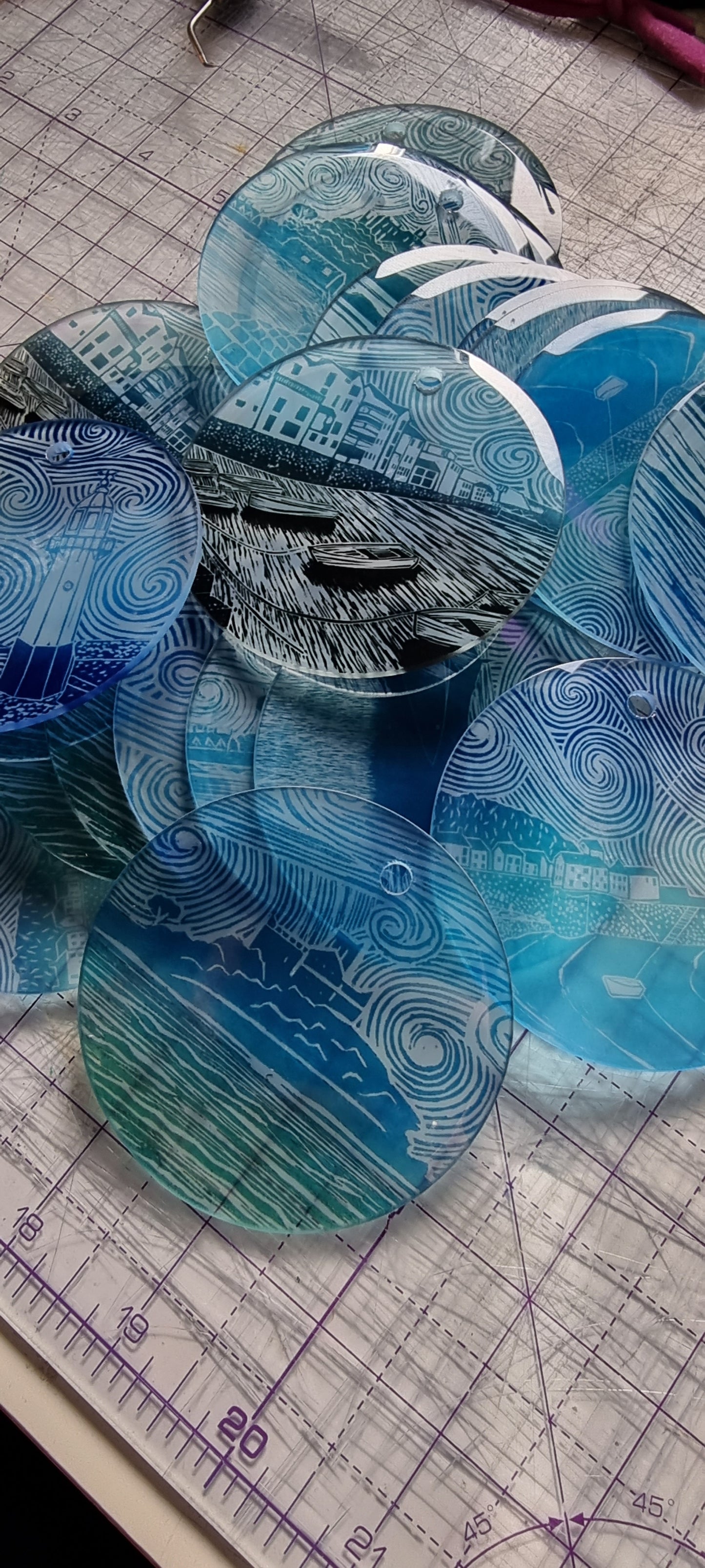 Glass decorations from lino print designs
