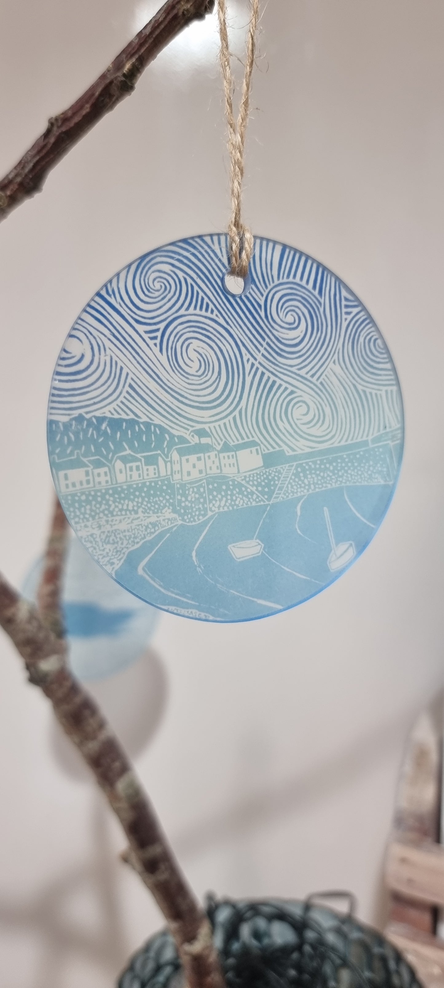 Glass decorations from lino print designs